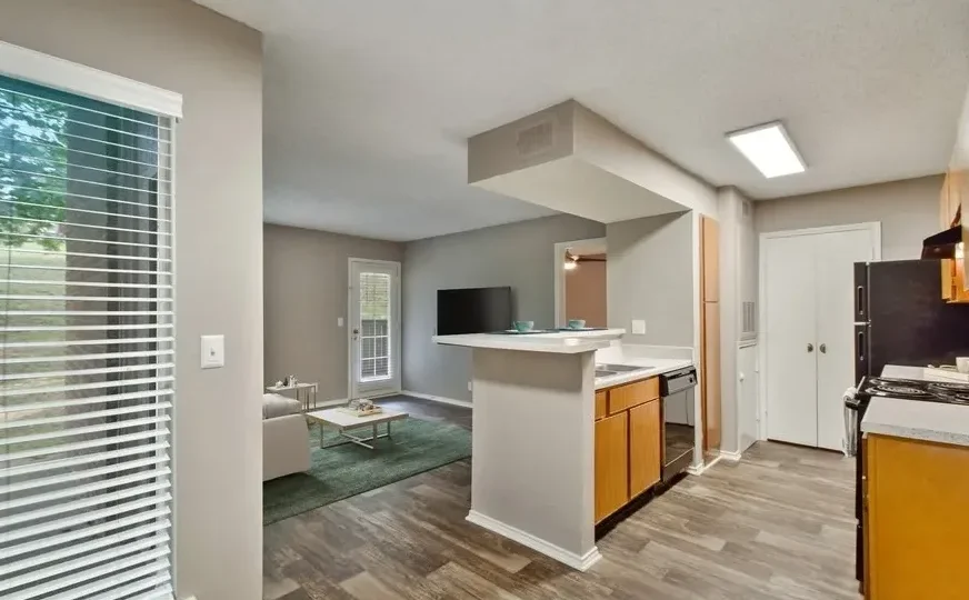 the kitchen and living room area of a home at The Hickory Highlands