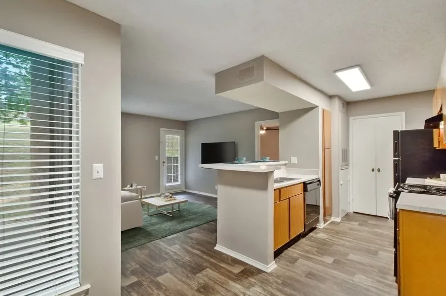 the kitchen and living room area of a home at The Hickory Highlands